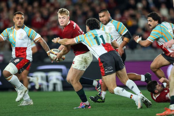 Qatar Airways 2025 British & Irish Lions Tour To Australia, Marvel Stadium, Melbourne, Australia 22/7/2025
First Nations & Pasifika XV vs British & Irish Lions
Lions Fin Smith with Triston Reilly of the First Nations & Pasifika XV
Mandatory Credit ©INPHO/James Crombie